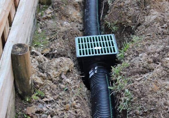 Our drainage solutions effectively manage water runoff, preventing erosion and ensuring the longevity of your landscape features. Downspout discharge, sump lines, draintile and french drains are just some of the services provided.  